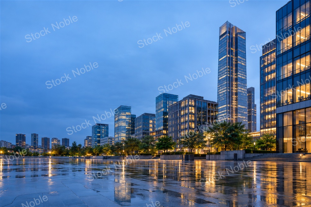Modern Glass Towers Reflecting on a Rainy Plaza at Dusk